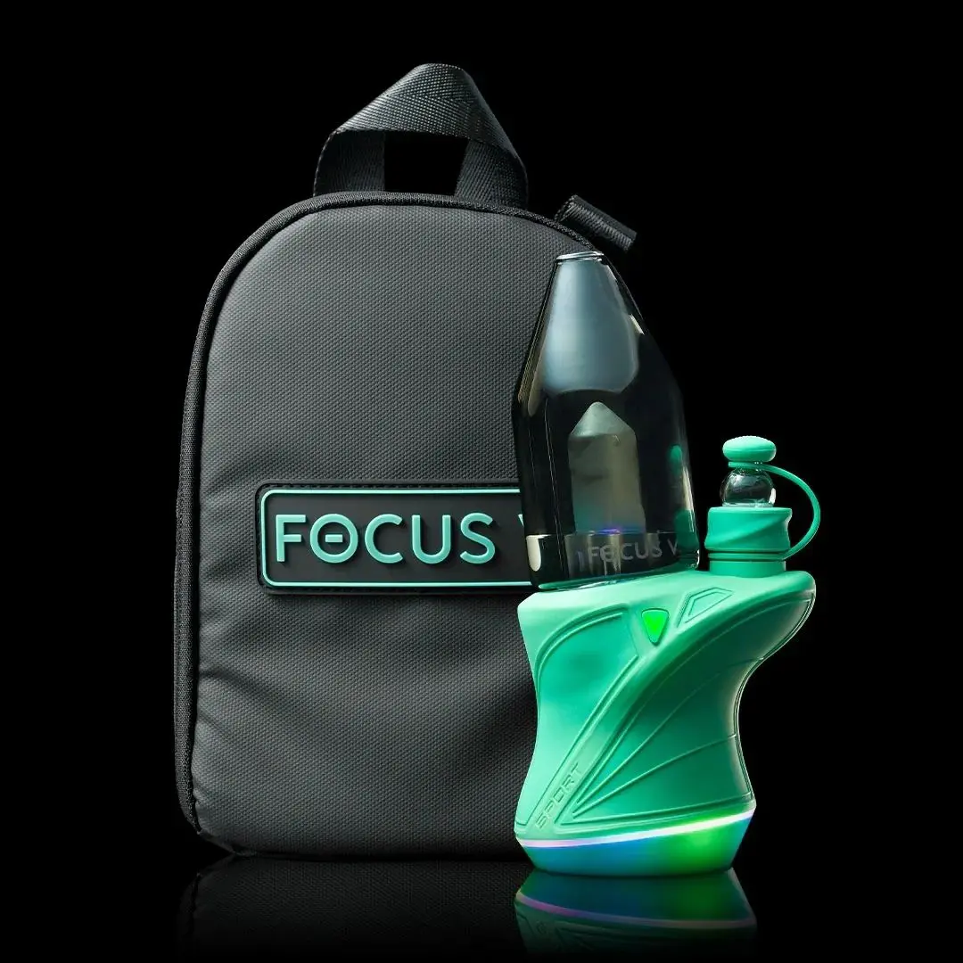 Vaporizer with carrying case on black background.