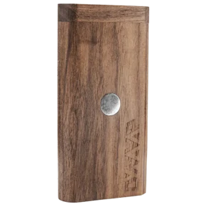 A wooden plank with a metallic circular object embedded in the center.