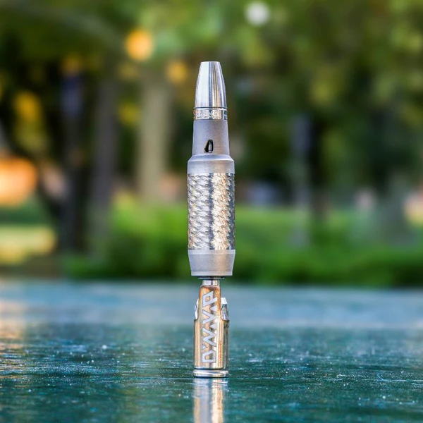 Metal vaporiser with green background