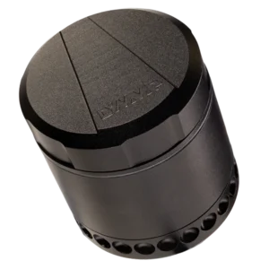 DynaGrynd by DanaVap, a black metal cylinder lying on its side on table